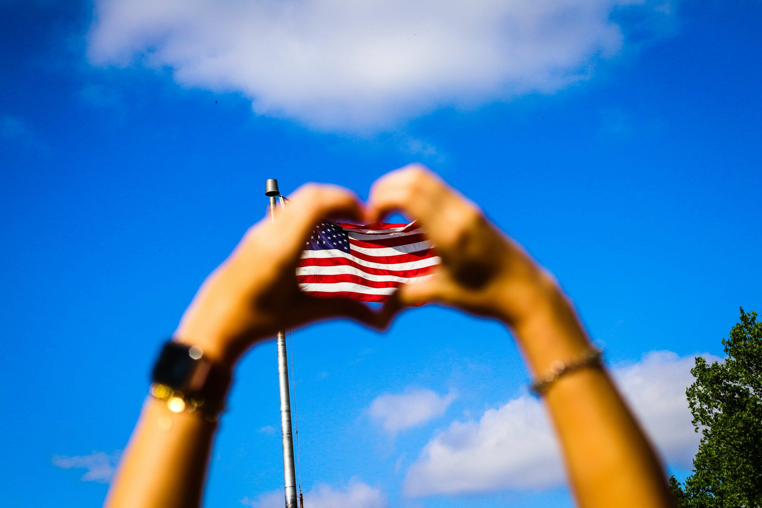 american flag with heart hands