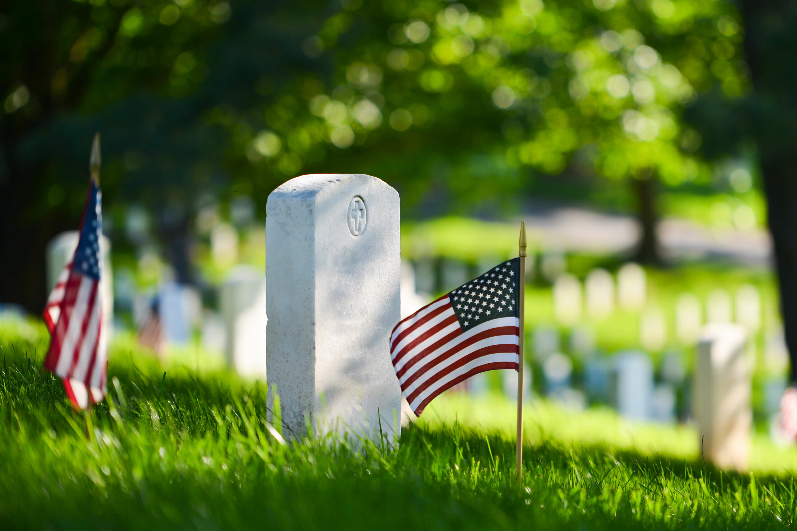 veteran headstone with flag